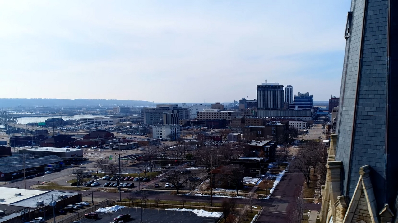 Aerial View of Downtown Peoria, Illinois, Showing City Streets and Buildings with The Illinois River in The Background