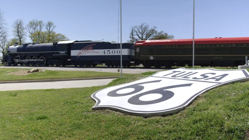 Historic Steam Locomotive and Route 66 Sign in Tulsa, a Popular Stop Along the Iconic American Road Trip